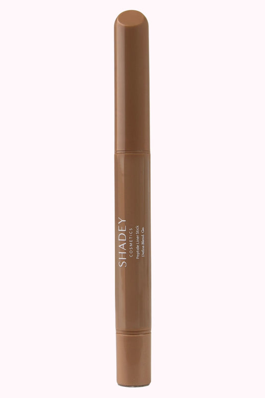 Brown makeup pencil with 'SHADEY' branding on a white background
