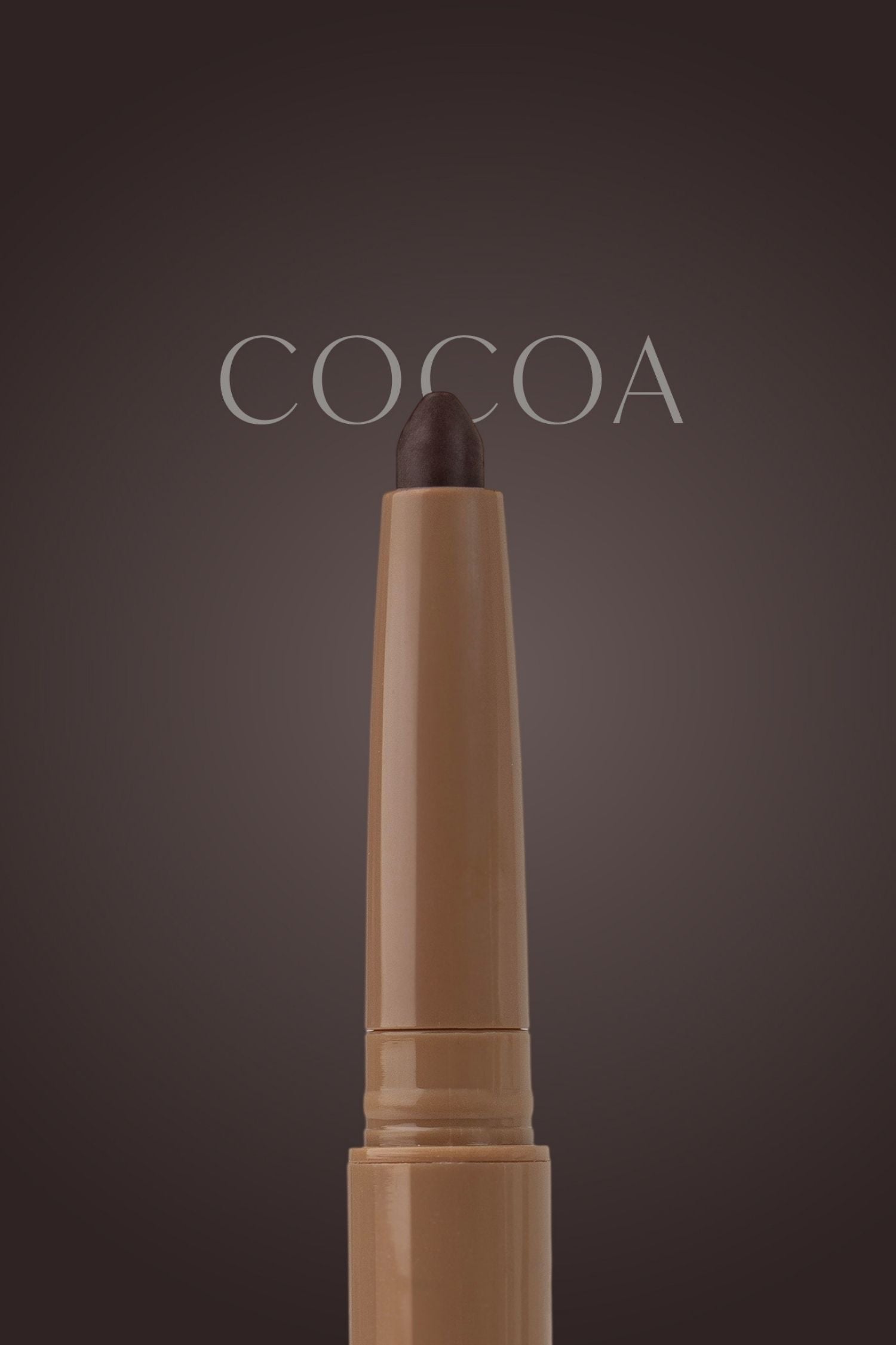 Cosmetic pencil labeled 'Cocoa' on a dark background